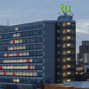 Illuminated windows in shape of a christmas tree, at the mathematics tower.