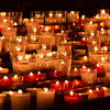 Many candles are lit together.