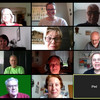 Several people participate in a video conference.