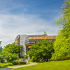 University Library building in summer, green trees in the front